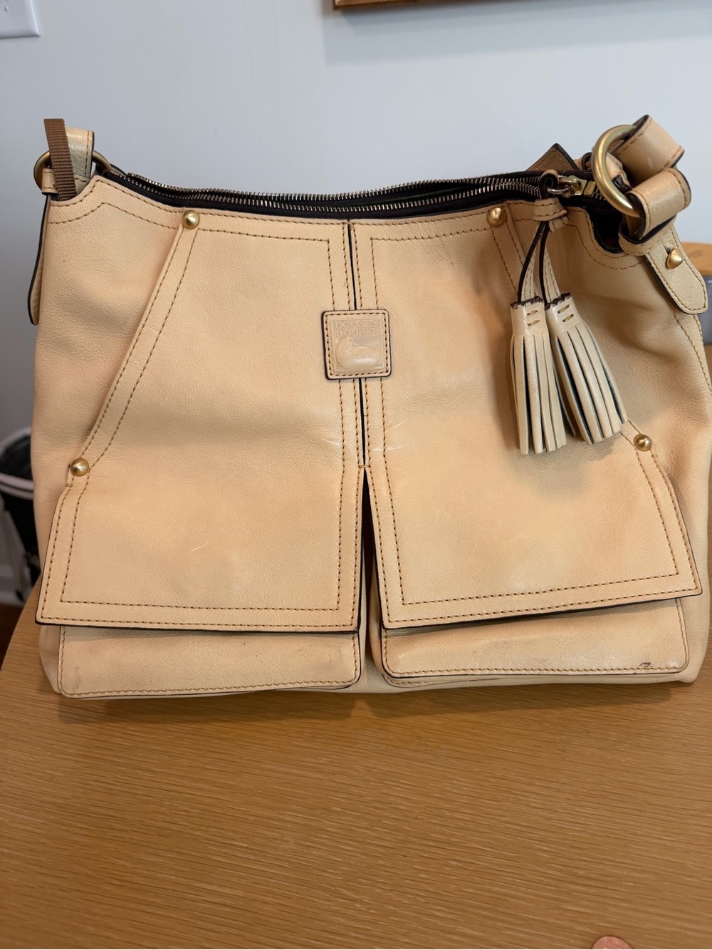 Dooney & Bourke Beige Leather Shoulder Bag with Tassels
